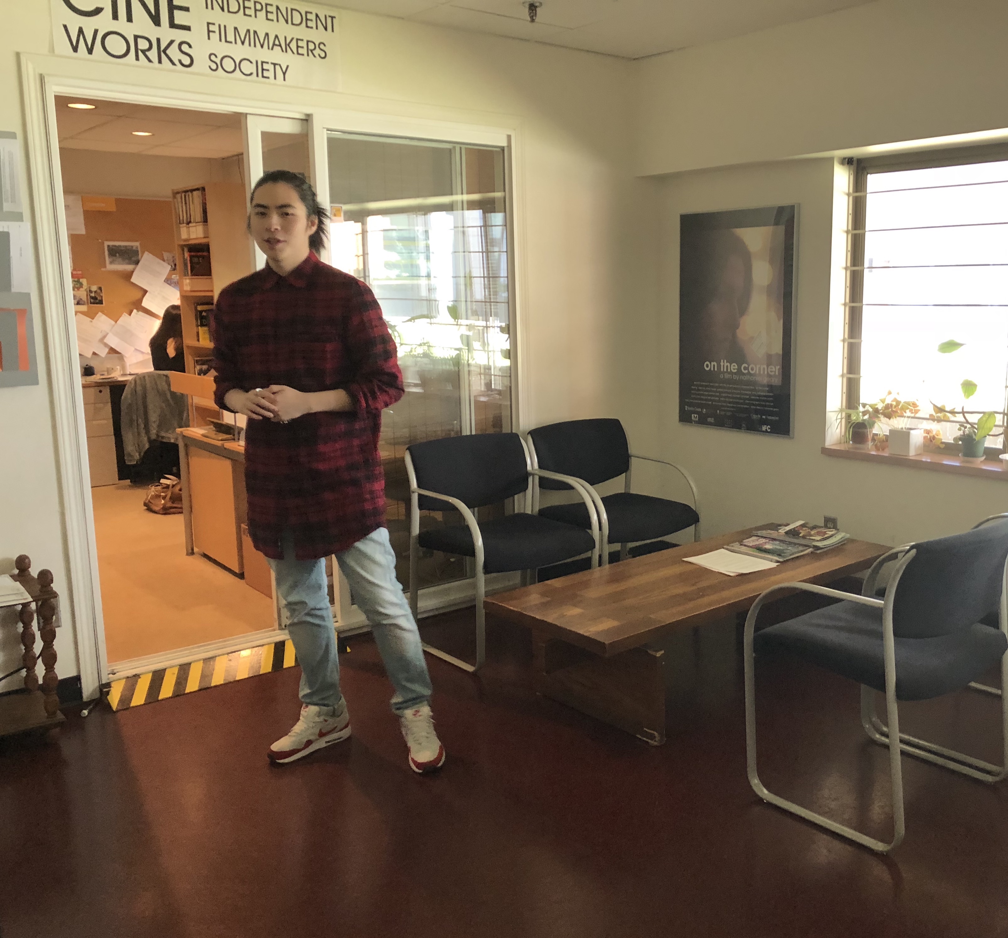Cineworks staff member standing in an otherwise empty room